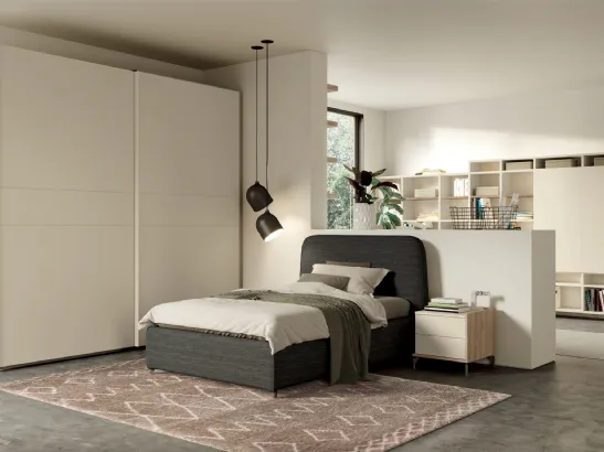 Cameretta componibile con letto imbottito, armadio ad ante scorrevoli e grande libreria a muro Momenti 11 di Febal