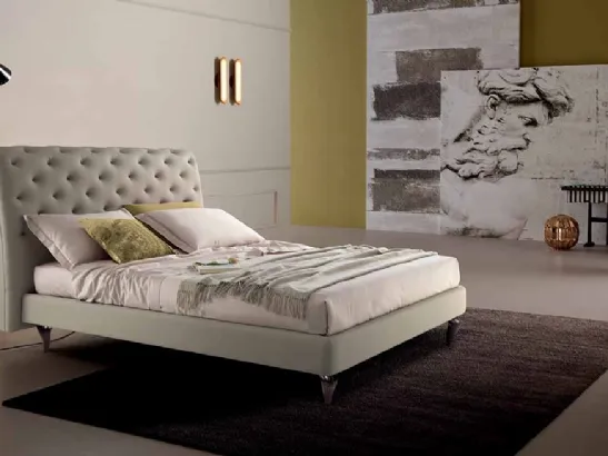 Letto in pelle con testiera lavorazione capitonnè rivisitata senza bottoni Eridano Cosmo Letti
