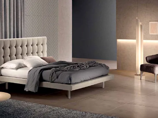 Letto in tessuto con testiera importante dalla lavorazione capitonnè Lince Moderno di Cosmo Letti
