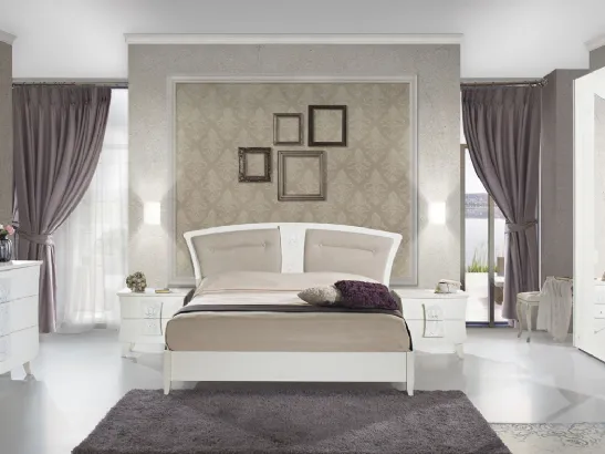 Letto con testiera decorata in legno con imbottitura Mary Decoro di Mobilificio AG