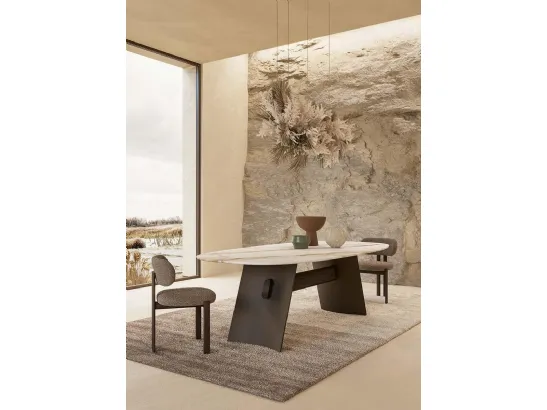 Tavolo con piano in marmo e struttura in metallo finitura bronzo Wave Nature Design